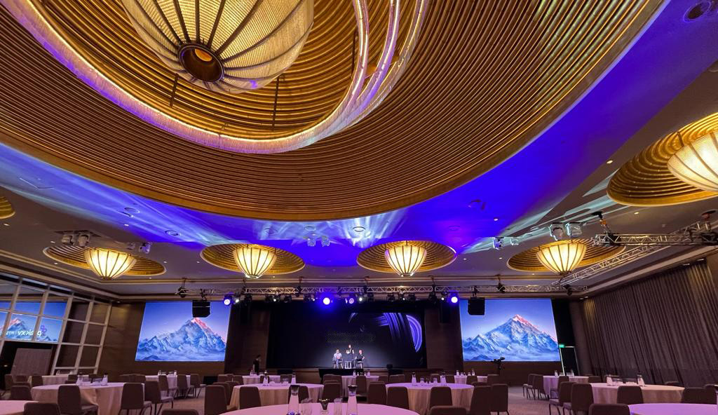 Live performance with professional stage lighting and sound reinforcement